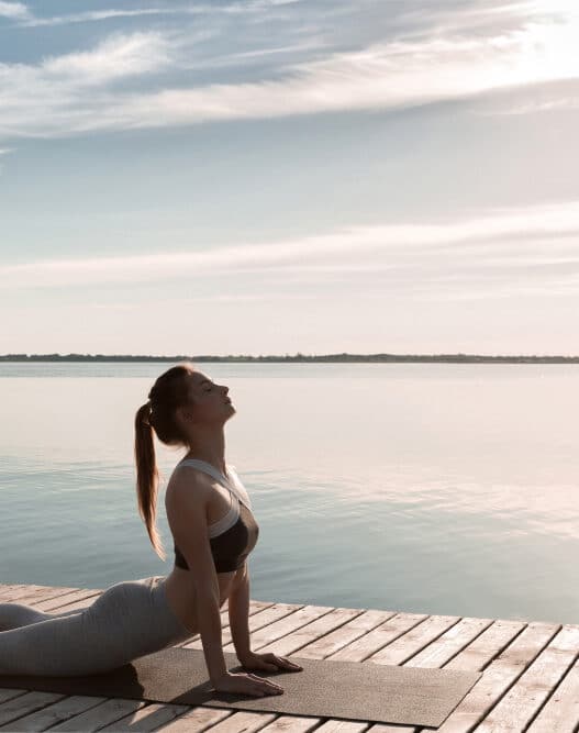 Woman meditating near the sea, health, cortex of lifestyle