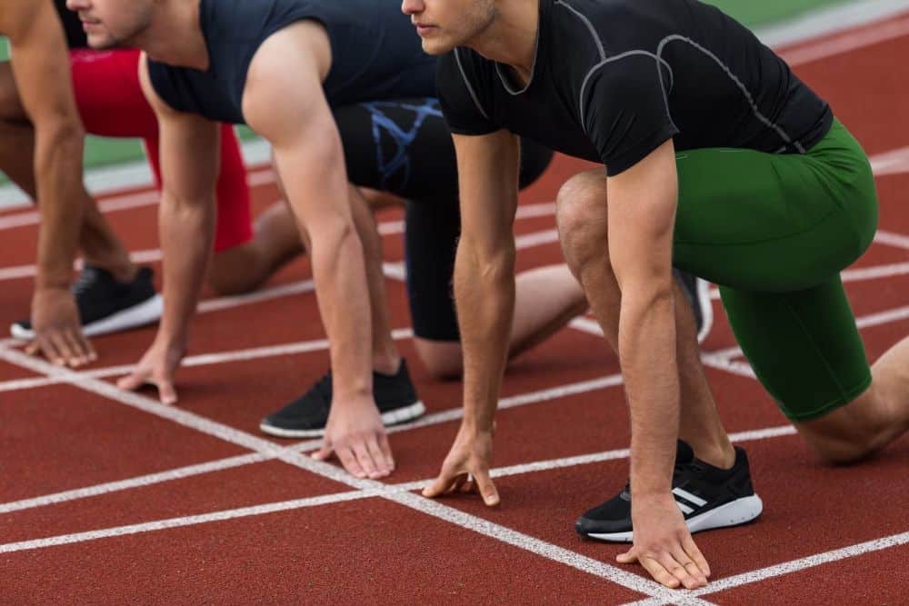 Athlete men posing to run for athletic performance