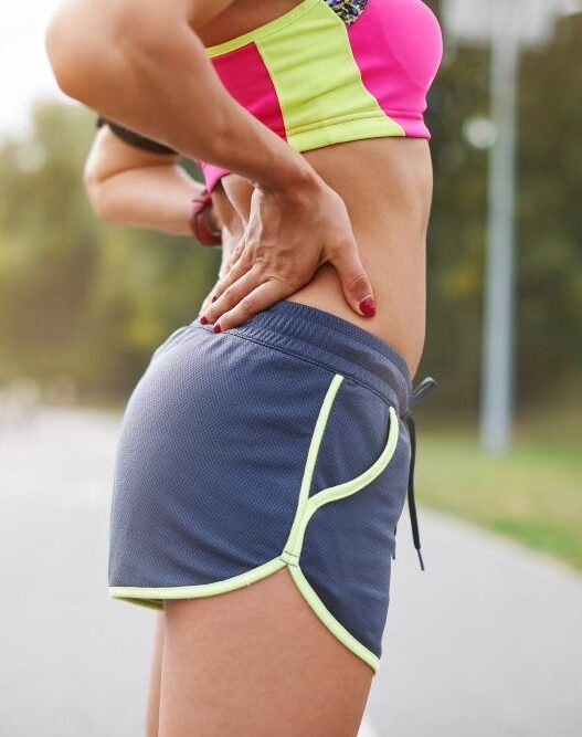 Woman Tight hip flexors symptoms