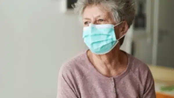 old woman with a mask