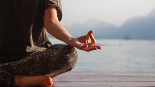 Woman meditating with meditative mind and mindfulness