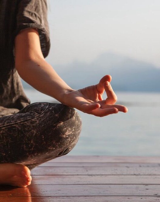 Woman meditating with meditative mind and mindfulness