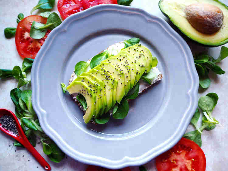chia seed on avocado in a plate, food