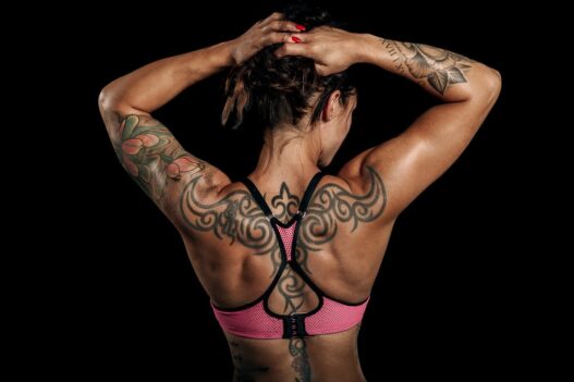 sports specific training, back side of a woman with a tattoo