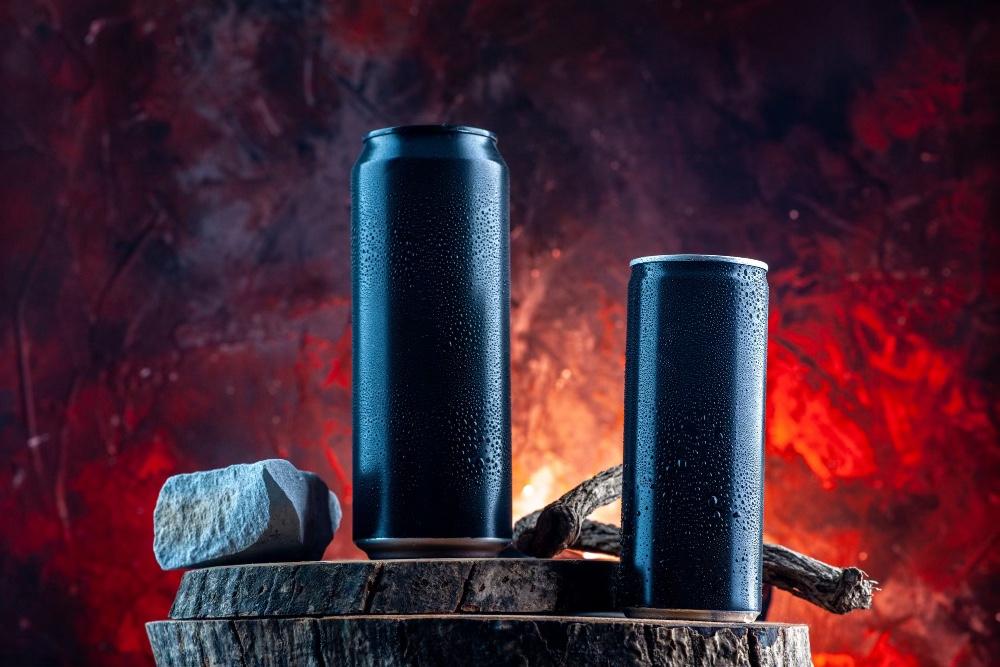 Black Can Energy drinks kept on stone showing side effects of energy drinks