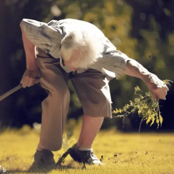 old man falling holding stick and leaves, safety awareness month