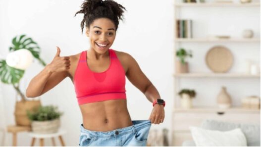 Woman happily showing weight loss from waist in Plenity Reviews of Gelesis 100