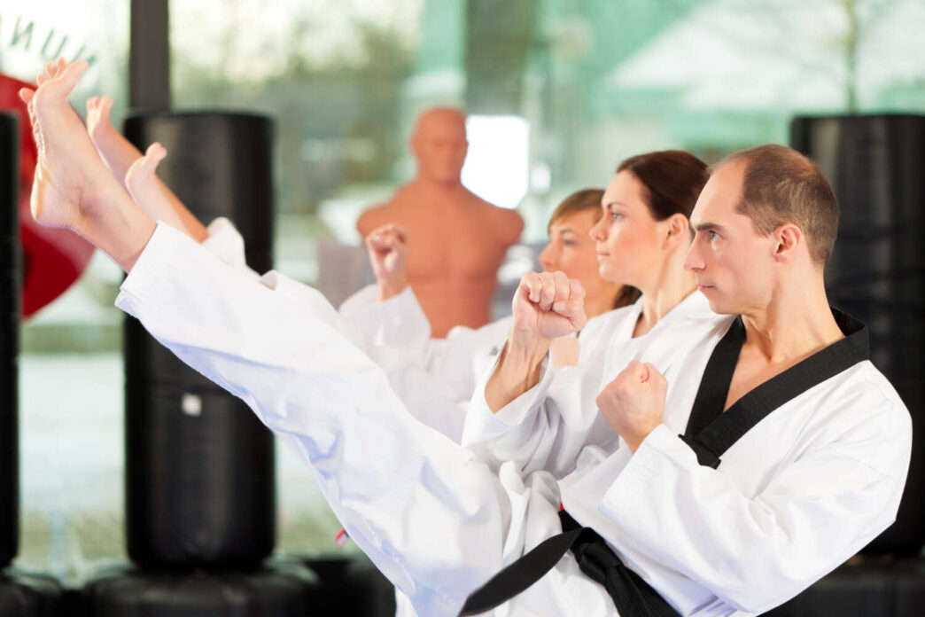 adults doing karate class