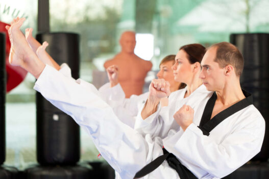 adults doing karate class
