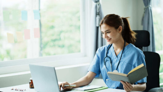 nurse with laptop, online second degree nursing programs