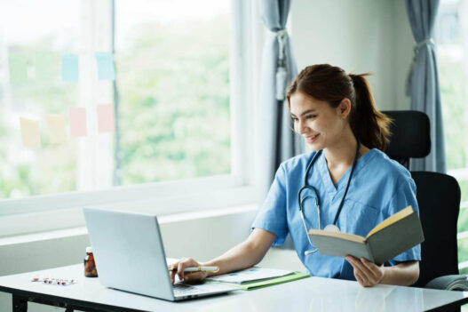 nurse with laptop, online second degree nursing programs