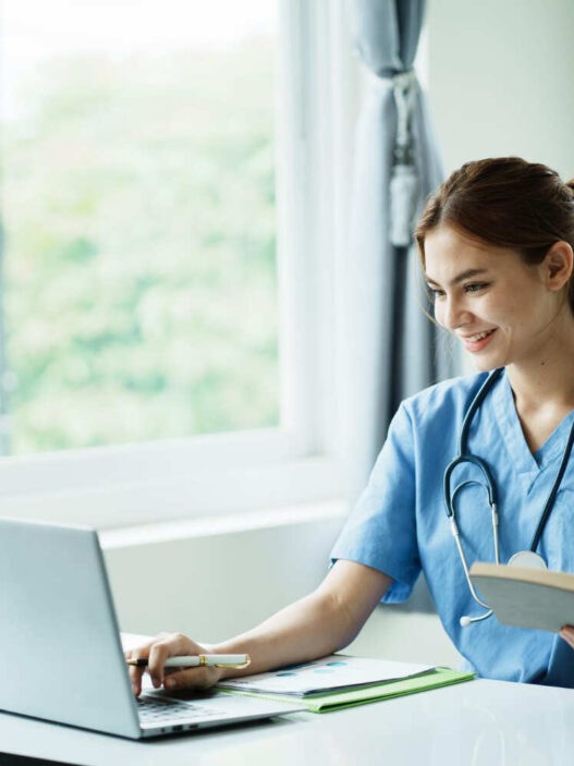 nurse with laptop, online second degree nursing programs