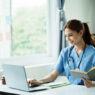 nurse with laptop, online second degree nursing programs