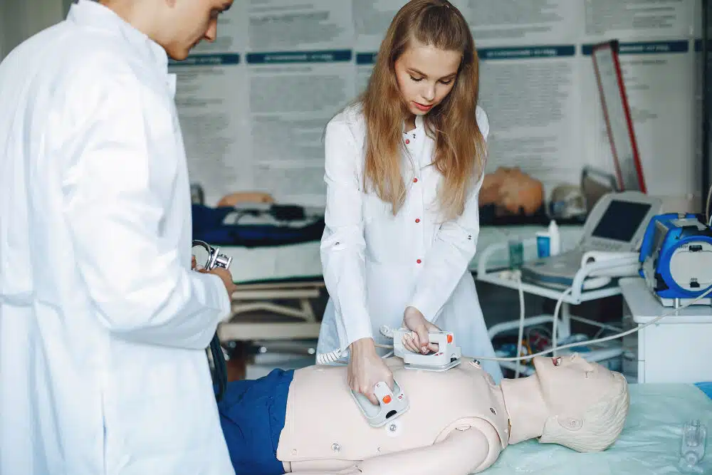 Two nurses, Simulation in nursing education using dummy body