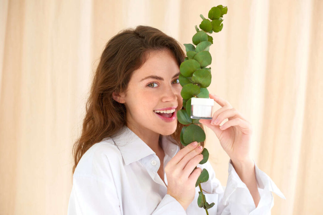 Woman holding plant and supplement Skinny fit Skinny greens, Skinny fit skinny greens reviews, ingredients
