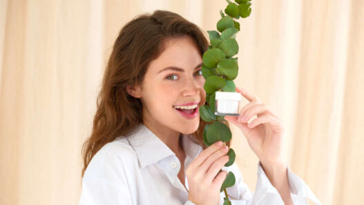 Woman holding plant and supplement Skinny fit Skinny greens, Skinny fit skinny greens reviews, ingredients