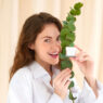 Woman holding plant and supplement Skinny fit Skinny greens, Skinny fit skinny greens reviews, ingredients