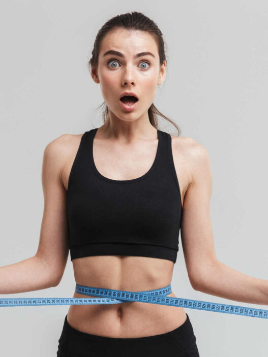Woman measuring waist with inch tape, K3 spark mineral scam, K3 spark mineral review
