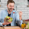 nutritional strategies, man eating bowl of veggies, nutrition male fertility