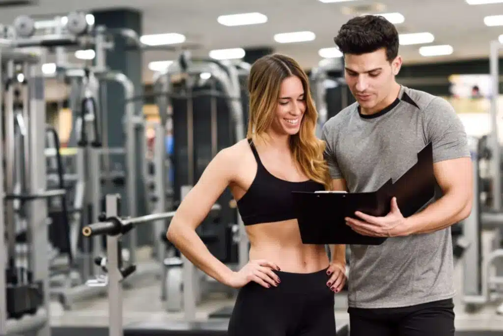 personal coaching, A male personal coach giving training to female, board certified health coach